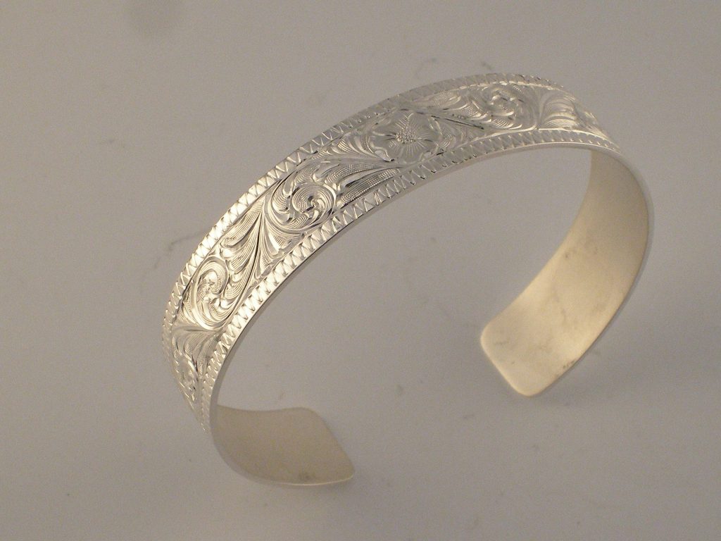 Custom handmade bright cut cuff bangle